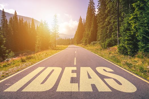 Ideas word written on road in the mountains