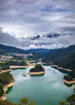 Panoramic view of lake of Centro Cadore in the Alps in Italy, Dolomites, near Belluno.