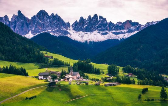 Famous best alpine place of the world, Santa Maddalena (St Magdalena) village with magical Dolomites mountains in background, Val di Funes valley, Trentino Alto Adige region, Italy, Europe