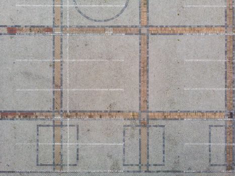 Top down look to parking places and concrete brick