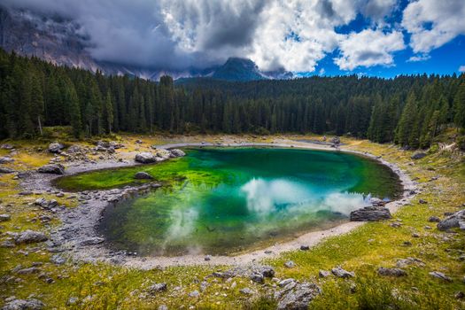 Carezza lake (Lago di Carezza, Karersee) with Mount Latemar, Bolzano province, South tyrol, Italy.