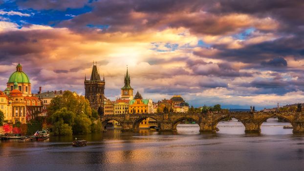 Famous Charles bridge in the sunset light, beautiful scenary and one of the iconic landmarks in Prague. Czech Republic.