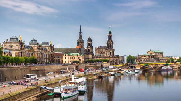 Augustus Bridge (Augustusbrucke) and Cathedral of the Holy Trinity (Hofkirche) over the River Elbe in Dresden, Germany, Saxony.