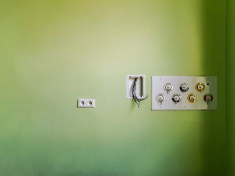 Oxygen and vacuum void connectors in old abandoned hospital room