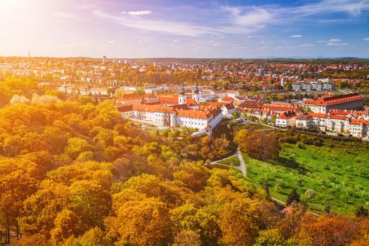 Prague, Czezh Republic. Scenic autumn aerial view of the Old Town with red foliage