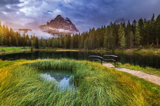 Antorno lake with famous Tre Cime di Lavaredo (Drei Zinnen) mount. Dolomite Alps, Province of Belluno, Italy, Europe. Beauty of nature concept background.