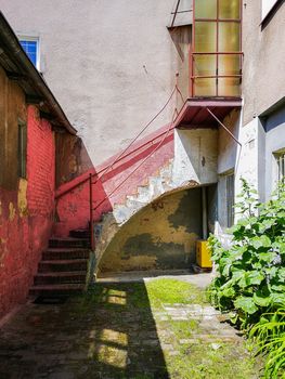 Old brick stairs to first floor of apartment