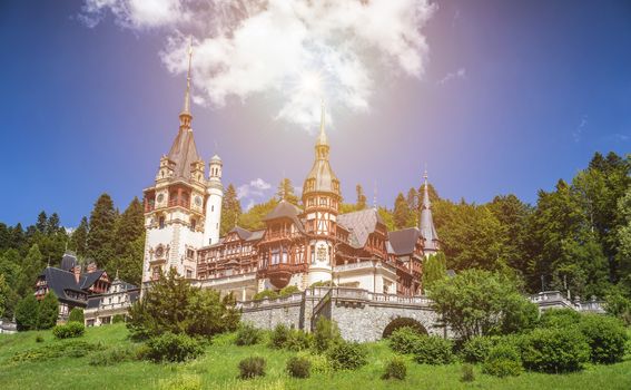 Peles Castle, Romania. Beautiful famous royal castle and ornamental garden in Sinaia landmark of Carpathian Mountains in Europe