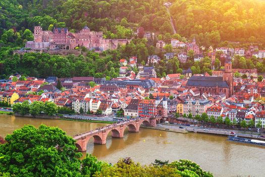 Panoramic view of beautiful medieval town Heidelberg including Carl Theodor Old Bridge, Neckar river, Church of the Holy Spirit, Germany