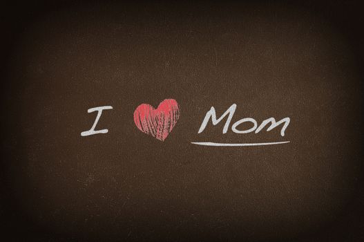 Blackboard with phrase, I love mom.