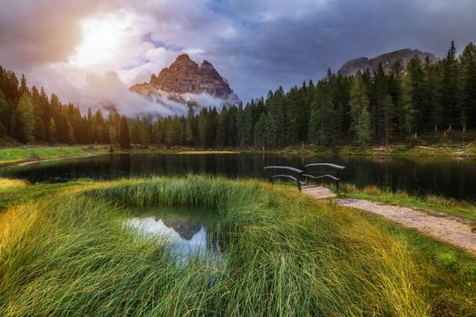 Antorno lake with famous Tre Cime di Lavaredo (Drei Zinnen) mount. Dolomite Alps, Province of Belluno, Italy, Europe. Beauty of nature concept background.