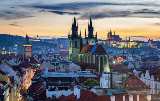Panorama of Prague with red roofs from above summer day at dusk, Czech Republic