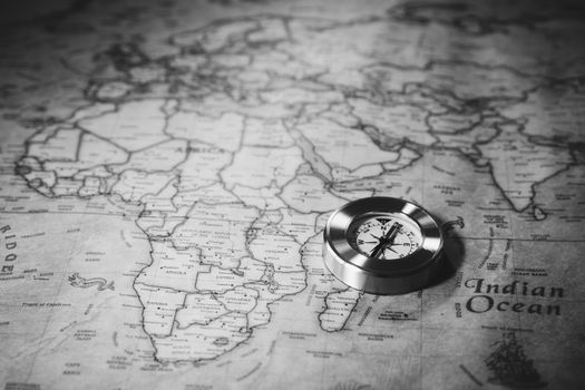 Columbus day and world map with compass