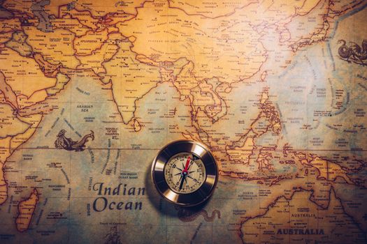 Columbus day and world map with compass