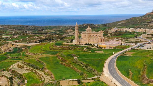 Aerial view over Basilica Ta Pinu in Gozo - a national shrine - aerial photography