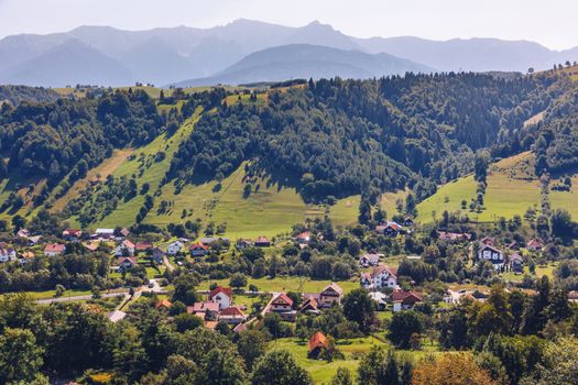 Summer alpine Transylvania landmark, landscape with green fields and valleys, high Piatra Craiului mountains, Carpathians, Transylvania, Romania, Europe