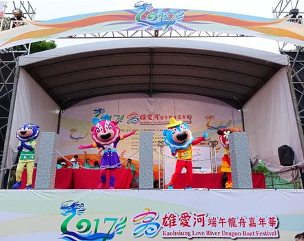 KAOHSIUNG, TAIWAN -- MAY 30, 2017: Dancers dressed up as mascots perform Chinese folk songs at the Dragon Boat Festival.