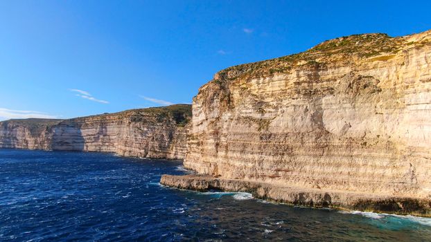 The amazing coast of Gozo - Malta with its steep cliffs - aerial photography