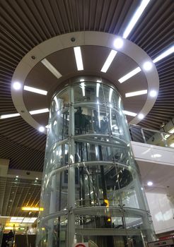 KAOHSIUNG, TAIWAN -- MARCH 23, 2014: This elevator shaft made from transparent material is located at the San Duo Station of the Kaohsiung Mass Rapid Transit system.