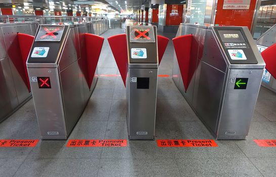KAOHSIUNG, TAIWAN -- JULY 8, 2014: Automatic ticket reading machines at the Kaohsiung subway system