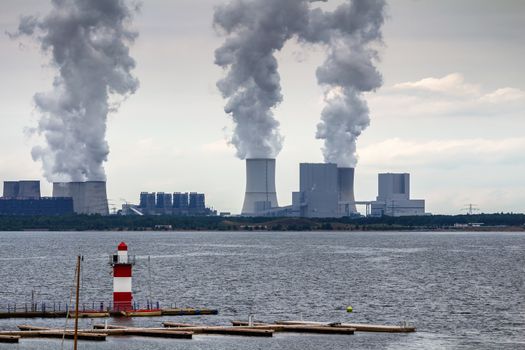 Nuclear power plant on the coast. Ecology disaster concept. 