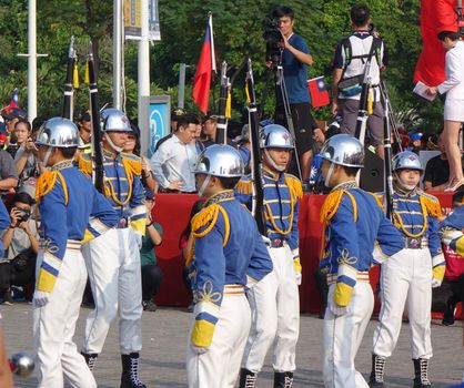 KAOHSIUNG, TAIWAN -- OCTOBER 10, 2019: Students dressed up as military honor guards show their skills at the national day celebrations, a free and public event. 
