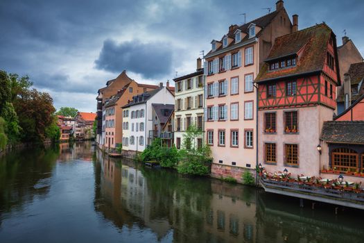 Beautiful view of the historic town of Strasbourg, colorful houses on idyllic river. Strasbourg, France