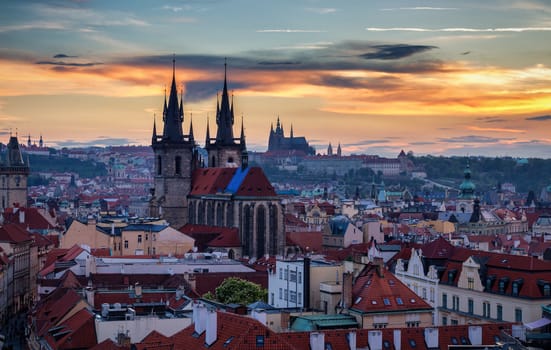 Aerial view over Church of Our Lady before Tyn, Old Town and Prague Castle at sunset in Prague, Czech Republic
