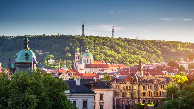 View of the Vltava River and the bridges shined with the sunset sun, Prague, the Czech Republic
