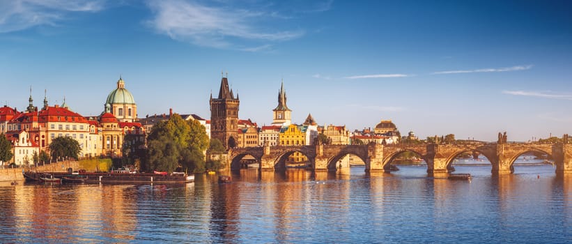 View of the Vltava River and the bridges shined with the sunset sun, Prague, the Czech Republic