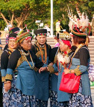 KAOHSIUNG, TAIWAN -- NOVEMBER 8, 2014: Taiwanese indigenous women are dressed in their traditional festive costumes