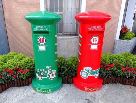 KAOHSIUNG, TAIWAN -- OCTOBER 1, 2017: Chunghwa Post introduces new mailboxes at the opening of the 2017 Ecomobility Festival. 
