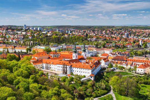 View of Strahov Monastery in Prague, Czech Republice. Red roofs and parks