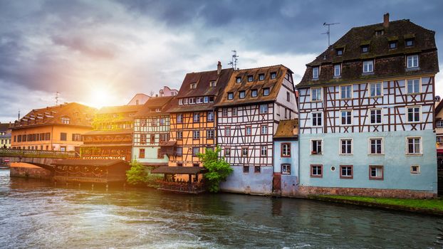 Beautiful view of the historic town of Strasbourg, colorful houses on idyllic river. Strasbourg, France