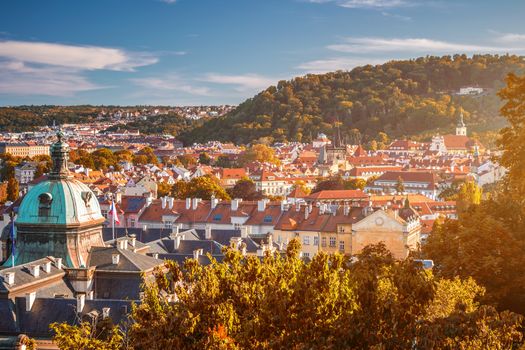 Prague, Czezh Republic. Scenic autumn aerial view of the Old Town with red foliage