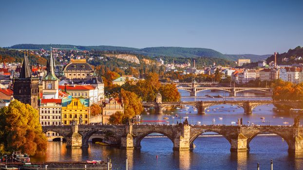 Prague, Czezh Republic. Scenic autumn aerial view of the Old Town with red foliage