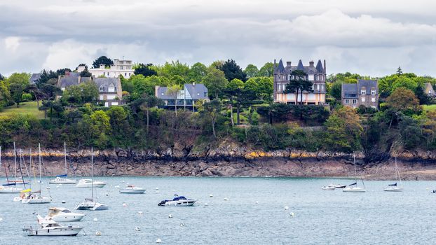 View of Dinard city with coastline full of boats. Brittany, France