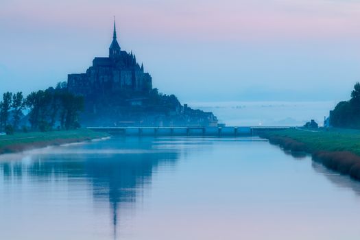 Mont Saint-Michel view in the sunrise light. Normandy, northern France