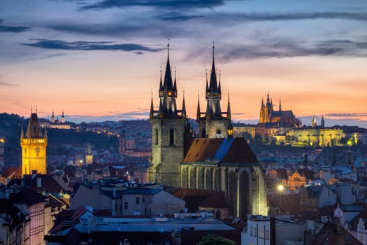 Famous Tyn Church on Old Town Square, Prague castle is visible in the background. Prague, Czech Republic