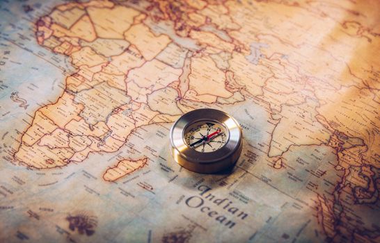 Columbus day and world map with compass