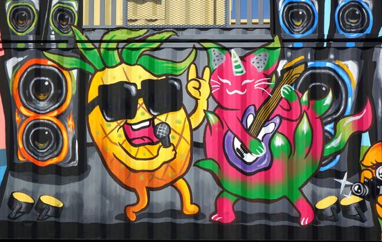 PINGTUNG, TAIWAN -- FEBRUARY 14, 2018: Shipping containers painted with colorful graffiti images form the entrance to the Pingtung Tropical Agricultural Fair.
