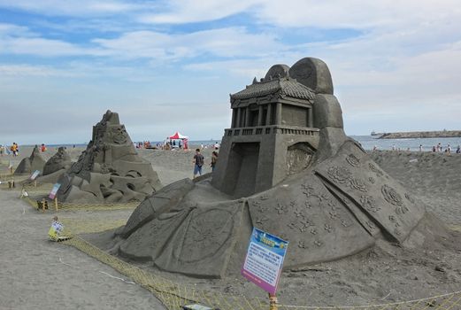KAOHSIUNG, TAIWAN -- JULY 27, 2019: Sand sculptures at the Black Sand Beach festival on Chijin Island.