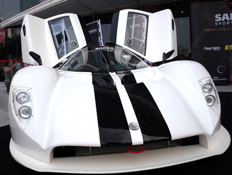 KAOHSIUNG, TAIWAN - FEBRUARY 24: To celebrate the opening of its Taiwan branch, Saker Sportscars demonstrates its RapX racing model on February 24, 2013 in Kaohsiung.