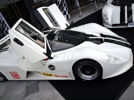 KAOHSIUNG, TAIWAN - FEBRUARY 24: To celebrate the opening of its Taiwan branch, Saker Sportscars demonstrates its RapX racing model on February 24, 2013 in Kaohsiung.