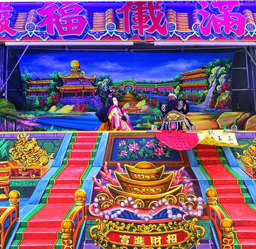KAOHSIUNG, TAIWAN -- OCTOBER 19, 2018: The Citian Temple puts on an outdoor puppet show that acts out religious themes and stories.