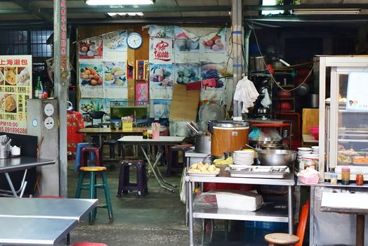 KAOHSIUNG, TAIWAN -- AUGUST 7, 2017: A traditional roadside restaurant offers snacks and light meals.
