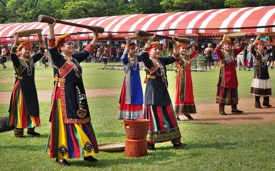 KAOHSIUNG, TAIWAN -- SEPTEMBER 28, 2019: Women of the indigenous Rukai tribe perform a dance during the traditional harvest festival.