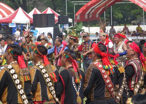 KAOHSIUNG, TAIWAN -- SEPTEMBER 28, 2019: Male members of the indigenous Rukai tribe perform a dance during the traditional harvest festival.