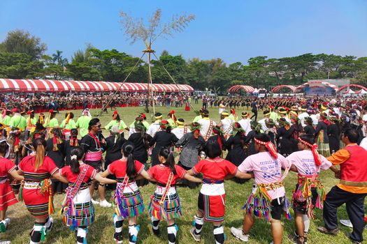 KAOHSIUNG, TAIWAN -- SEPTEMBER 28, 2019: Various indigenous tribes dance in a large circle during the traditional harvest festival.
