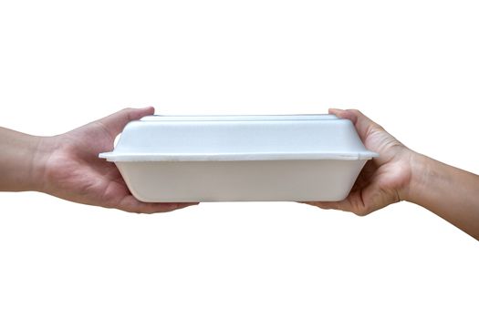 The hand of the person is taking the food box